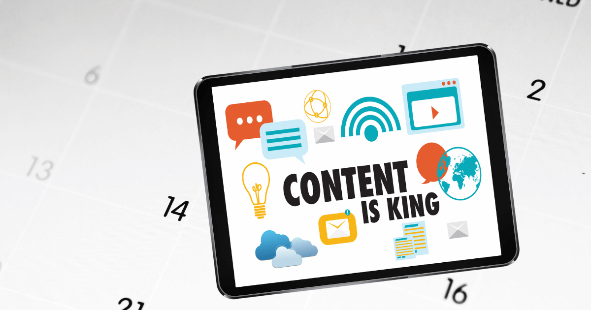 calendar with a tablet over it that says content is king