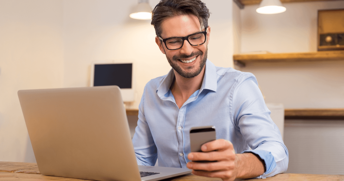 Business owner watching user-generated content video on smartphone